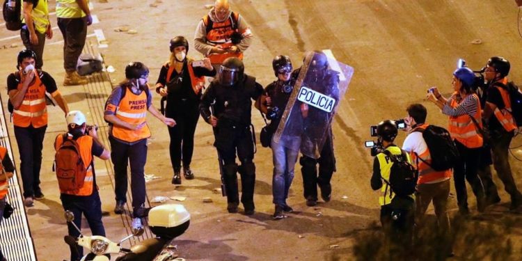 Detención del fotoperiodista de El País